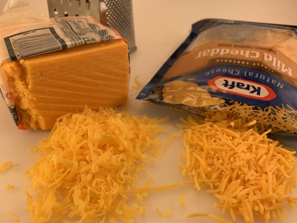 comparing product shelf life on block or shredded cheese